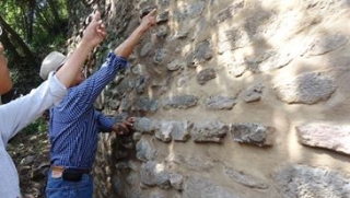 With archaeologists 